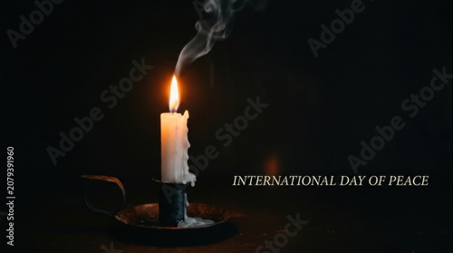 Peace Candle On Dark Background