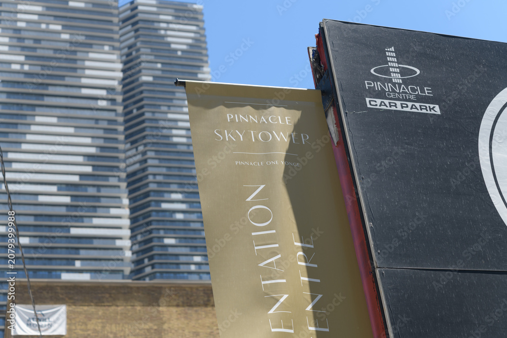 Obraz premium signs near Pinnacle International Sky Tower at 1 Yonge St, Toronto