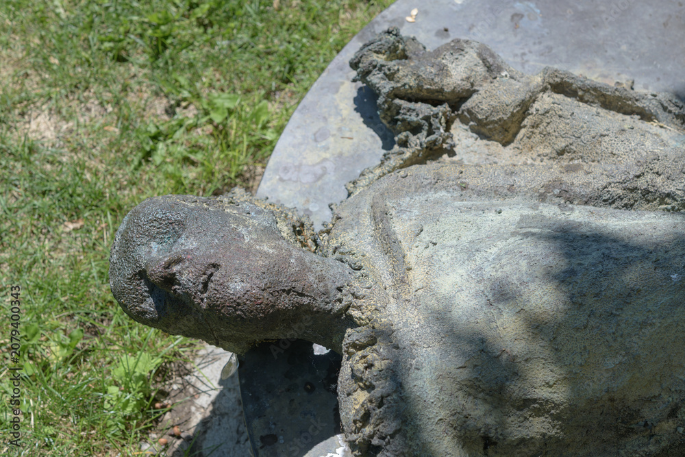 Obraz premium haunting bronze sculpture (The Fallen Figure) by Irish sculptor Rowan Gillespie at Ireland Park, a powerful waterfront memorial at Éireann Quay, Toronto