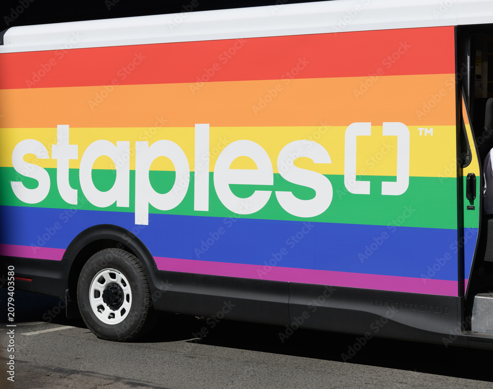 Obraz premium Staples wordmark on the side of a float with rainbow at Pride Day parade 2026, Toronto 