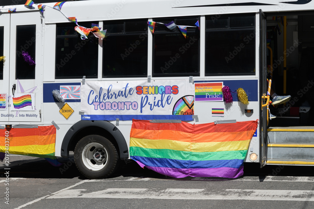 Obraz premium long-term seniors ambulatory shuttle or minibus all decked out for Pride Day Parade 2026, Toronto