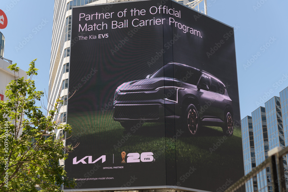 Obraz premium Kia digital advertising at Sankofa Square for their EV5, a compact electric SUV, Toronto
