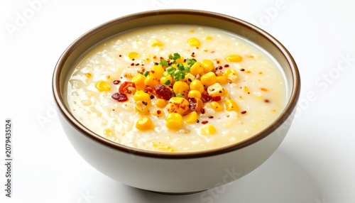 creamy sweet corn hot soup in a white bowl