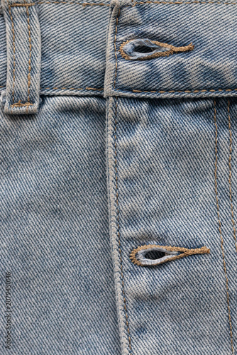 Fotografie Detail of denim buttonhole on waistband