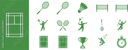 Foto Badminton players compete fiercely on court with rackets and shuttlecocks nearby
