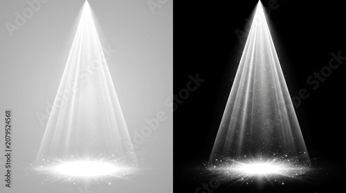 Bright white stage spotlights shining downward with glowing dust particles on dark and light backgrounds