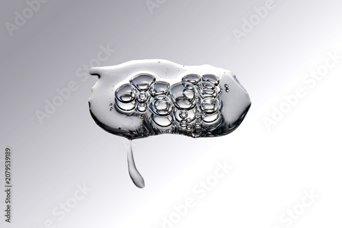 Принти на полотні Clear gel serum with bubbles showing cosmetic texture