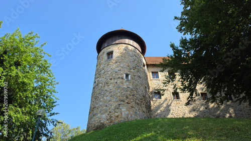 Valokuva Ancient stone fortress bastion with a rounded wooden top structure standing on a