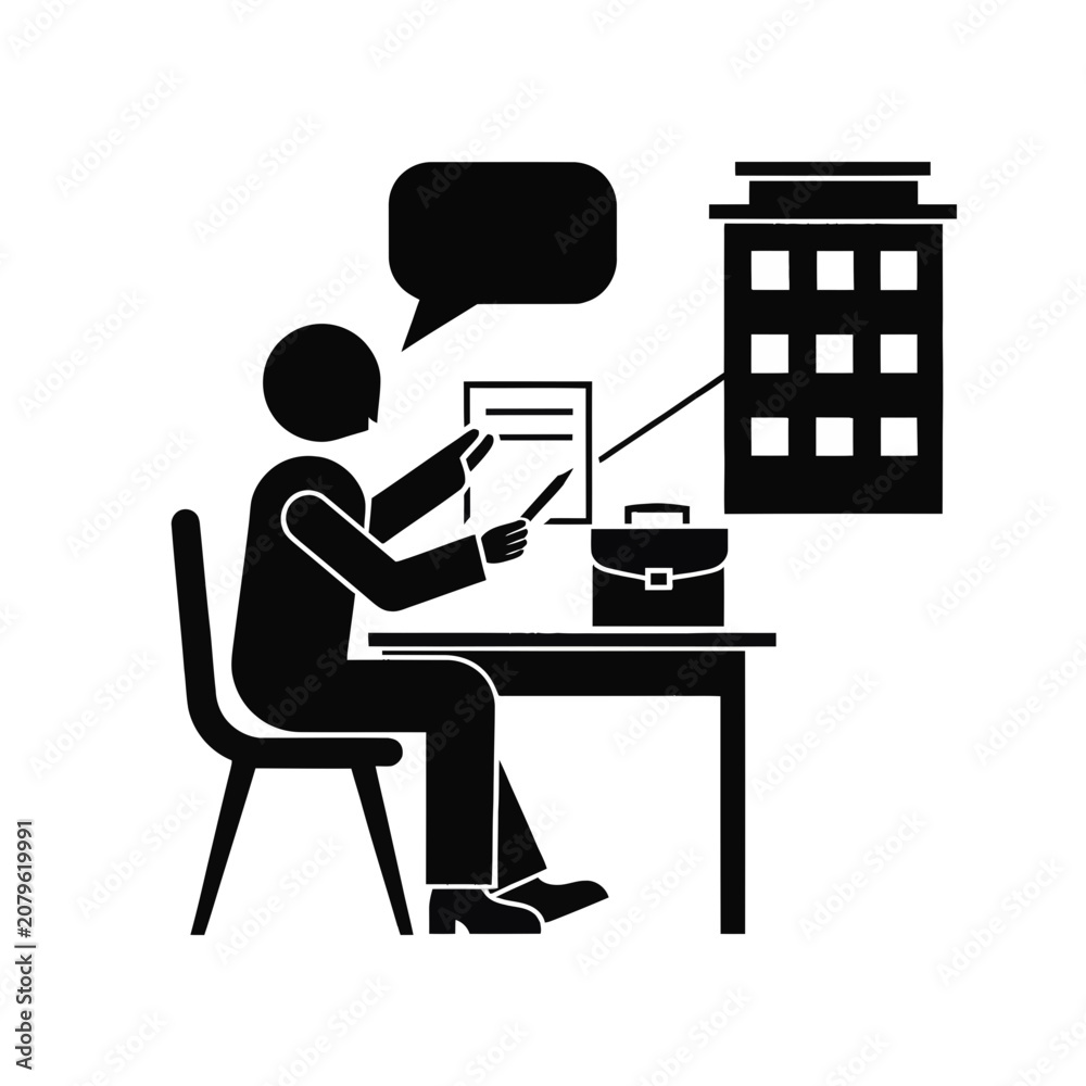 Fototapeta premium Consultant sits at a desk while reviewing architectural building plans for a new development.