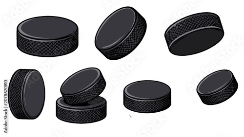 Foto Set of black ice hockey pucks in different angles