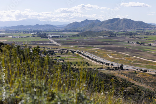 Bild auf Leinwand The Domenigoni Parkway winds through western Hemet with Winchester and fields in the distance
