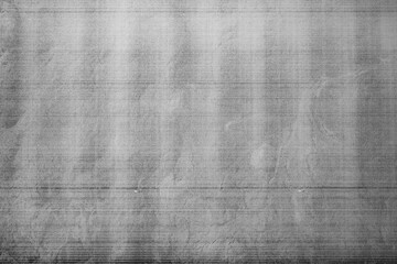 Monochrome macro shot of an inkjet print on a white piece of paper, with interesting patterns and digital textures