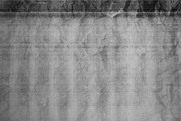 Monochrome macro shot of an inkjet print on a white piece of paper, with interesting patterns and digital textures