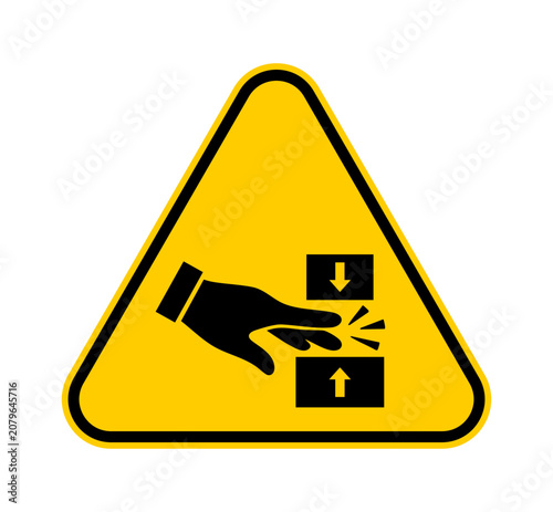 Fotografie Crushing hazard warning sign icon with pinch point symbol