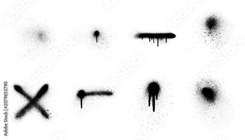 Photos Collection of black spray paint splatters, an 'X' mark, and textured strokes, isolated on transparent background for urban art