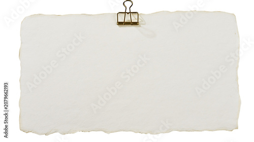 Photos Rough textured paper sheet held by a binder clip, isolated on transparent backgr