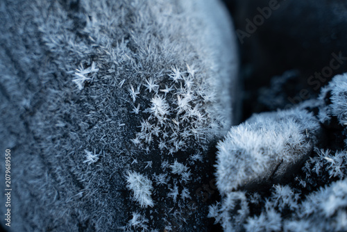 Abstract macro shot of frozen blue glacial ice in Iceland
