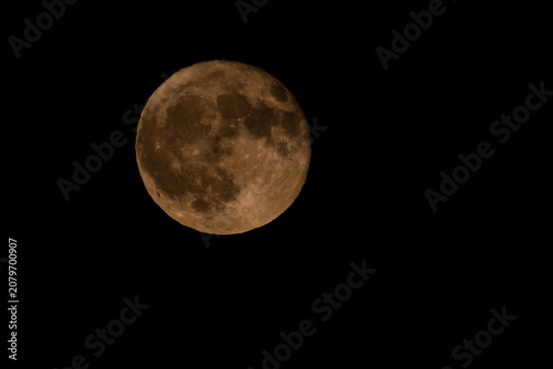 ​Strawberry Full Moon Orange Glow in June Night Sky Greece.