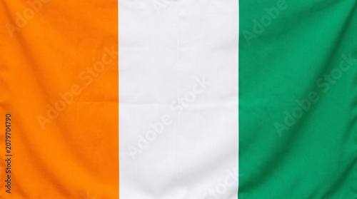   
Ivory Coast flag with orange, white, and green vertical stripes, symbolizing savanna, peace, forests, and hope for national unity and identity.