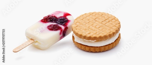 Close up of frozen dessert and biscuit sandwich against a white background