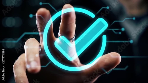 Close up of hand touching bright neon checkmark button for digital authentication.