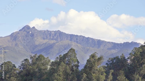 Quito, Ecuador - June 29, 2026: The Pasochoa volcano is an inactive volcano located in the Eastern Cordillera of the Andes, illuminated by the last rays of the sun of the day, in a beautiful sunset.