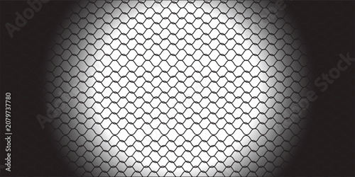 Cuadro en lienzo Black and white chain link fence background with central spotlight effect and ab
