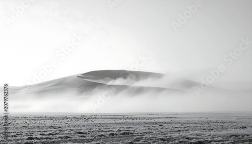 Misty Landscape with Rolling Hills and Fog.