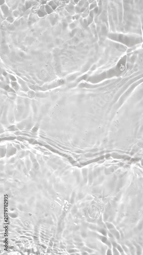 water waves cross each other creating ripples in slow motion.