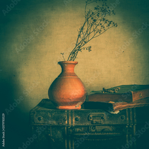 Still life with old flower on vase background