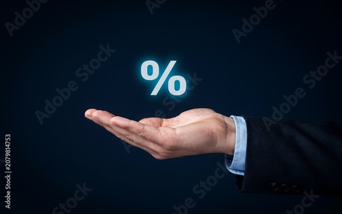 
Business Hand Holding Percentage Symbol Representing Interest Rate, Discount and Financial Concept

