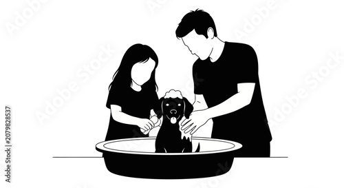 Two people bathing a black dog in a tub.