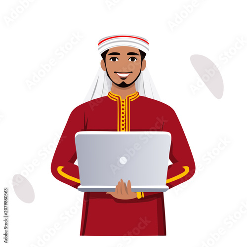 Man in traditional clothing using a laptop