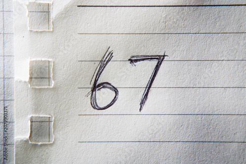 Number 67 Handwritten on Lined Paper Notebook. Gen Alpha Meme Trend.