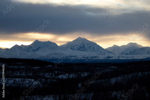 Snowy mountain at sunset in Alaska.