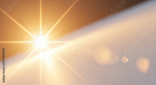 Abstract golden sun flare effect with light leaks.