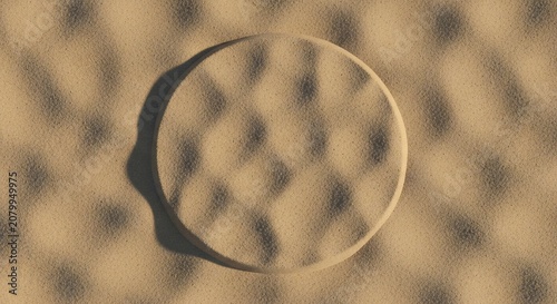 Abstract circular magnifying lens over a textured brown surface.
