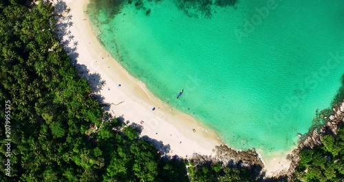 Aerial view Drone camera of seashore rocks in summer season, Beautiful freedom beach in Phuket Thailand, Amazing sea waves crashing on rocks seascape in Phuket island Thailand