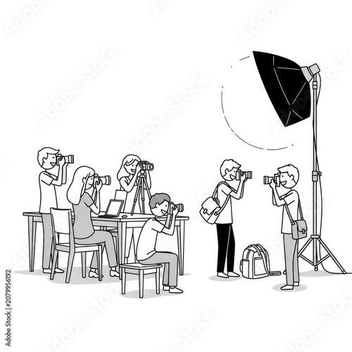 Photographers at work in studio setting.