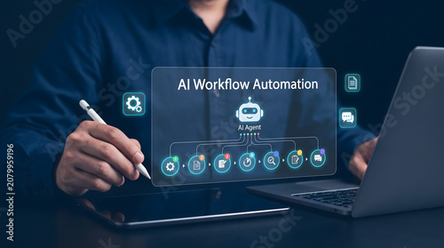 Man Working on Laptop with AI Workflow Automation on Screen in Dark Office Setting with Blue Shirt and Stylus Pen
