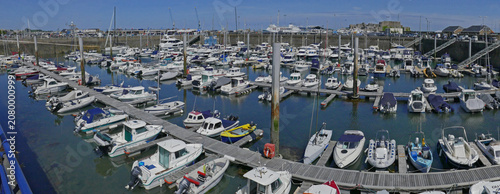 Schilderij op canvas Colourful Guernsey Harbour -a British Isles popular Port of Call for tourism & cruise ships