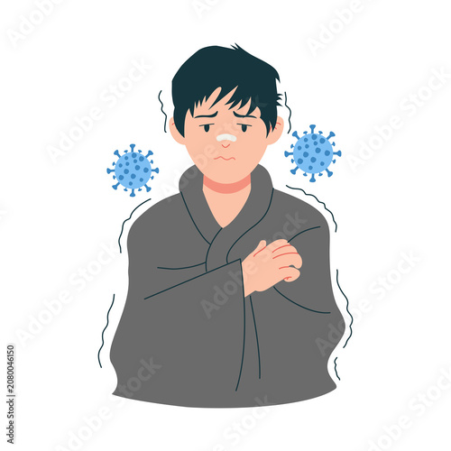 Fotografie Young person wrapped in a blanket experiences chills from a contagious illness