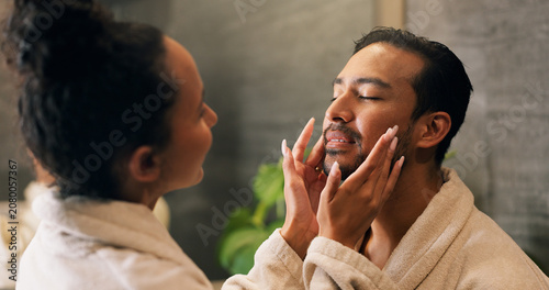 Tableau sur toile Couple, skincare and face cream in bathroom with morning routine, dermatology or hydration benefits