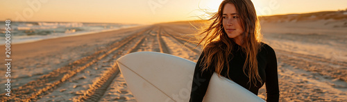 Sunset Surfer: A young woma...