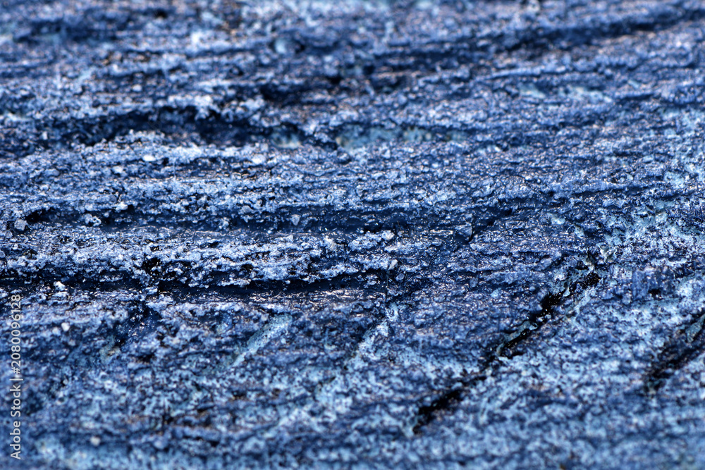 Naklejka premium Close-Up dark vintage plaster background with deep scratches