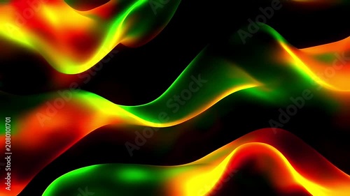 Abstract background with flowing liquid waves of vibrant red yellow and green colors on black.