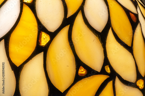 Amber Stained Glass – Abstract Background Made of Amber Mosaic Pieces