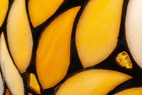 Amber Stained Glass – Abstract Background Made of Amber Mosaic Pieces