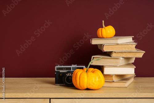 Photo camera with pumpkins ...