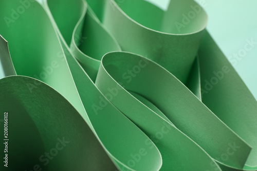 Twisted sheets of green pap...